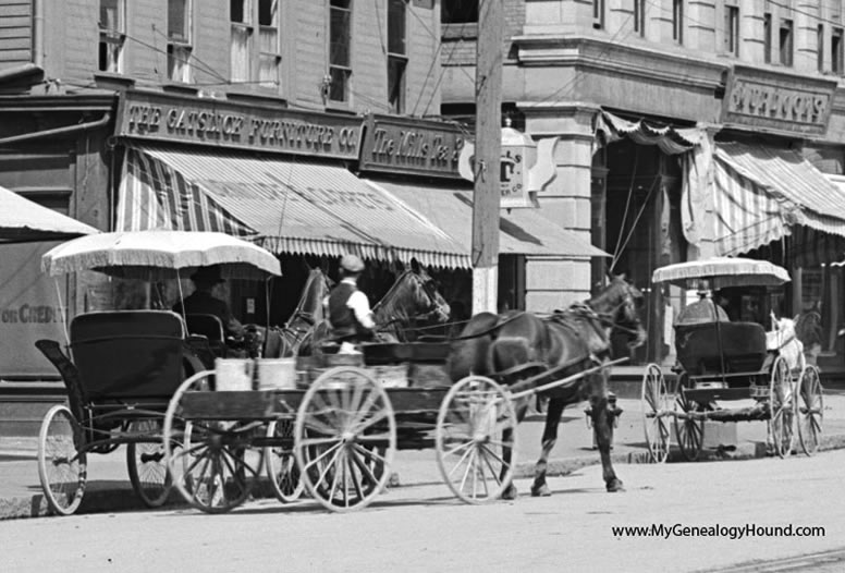 North Adams, Massachusetts: Horse drawn vehicles in front of the furniture store